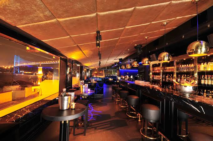 Blackk's waterfront lounge with the Bosphorus Bridge visible outside