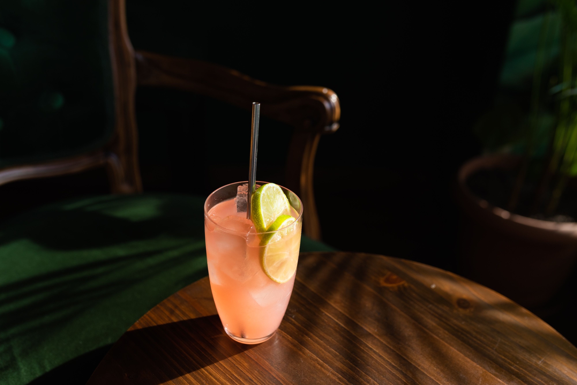 A classic cocktail being made at Tavern's warmly lit bar