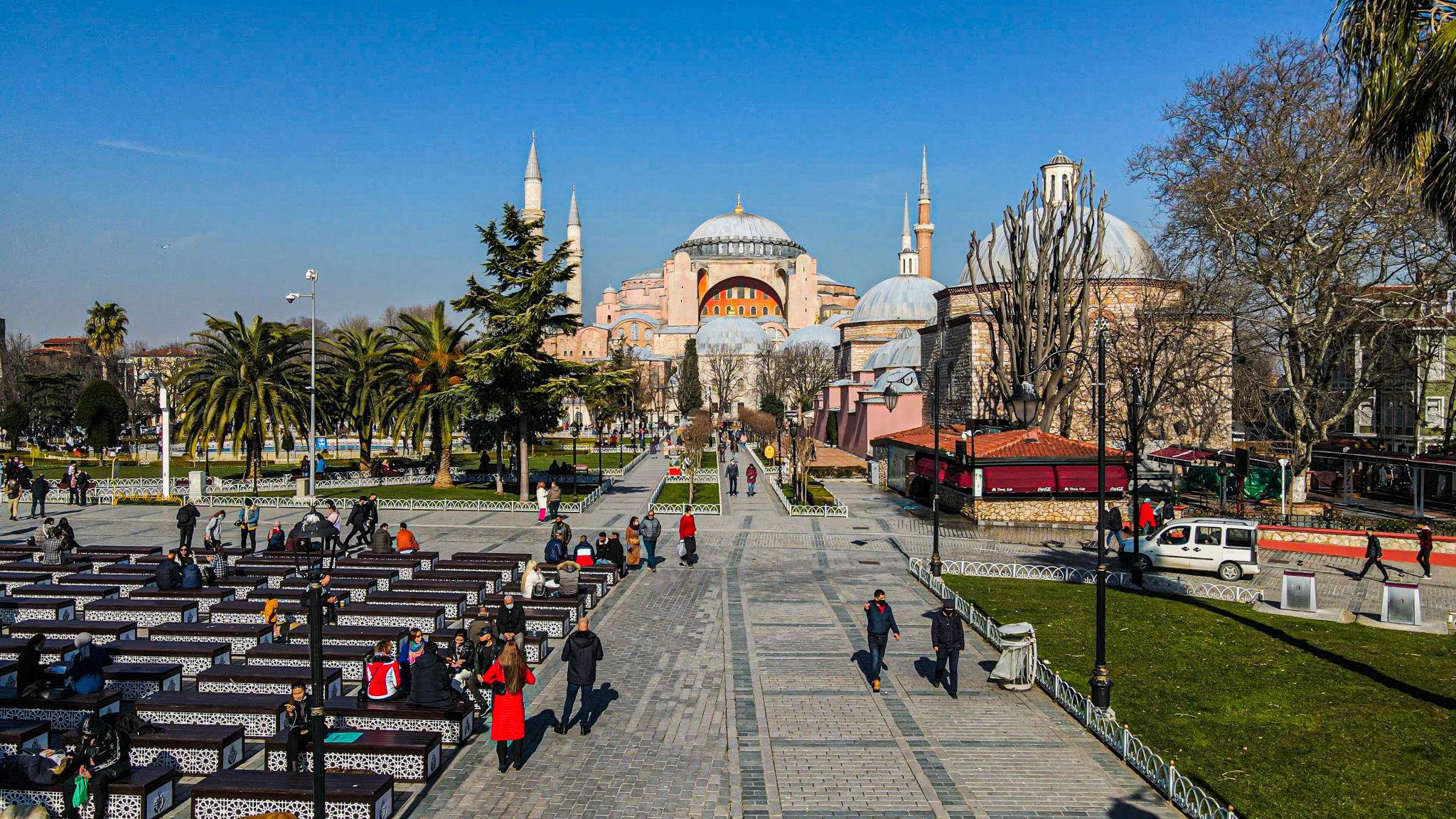 Sultanahmet Square with Hagia Sophia in the background, busy with visitors in daylight